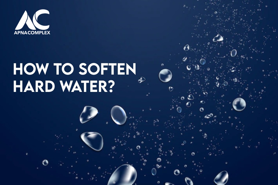Text saying "how to soften hard water" with water bubbles and ApnaComplex logo on a dark blue background